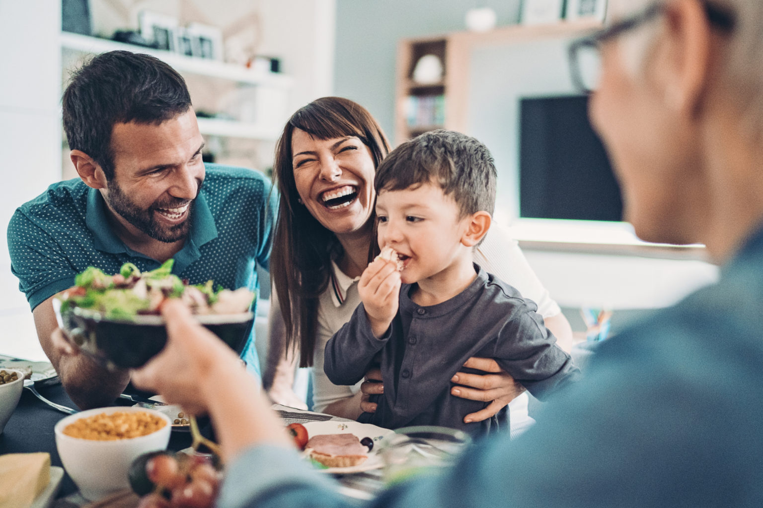 Multi-generation family eating together